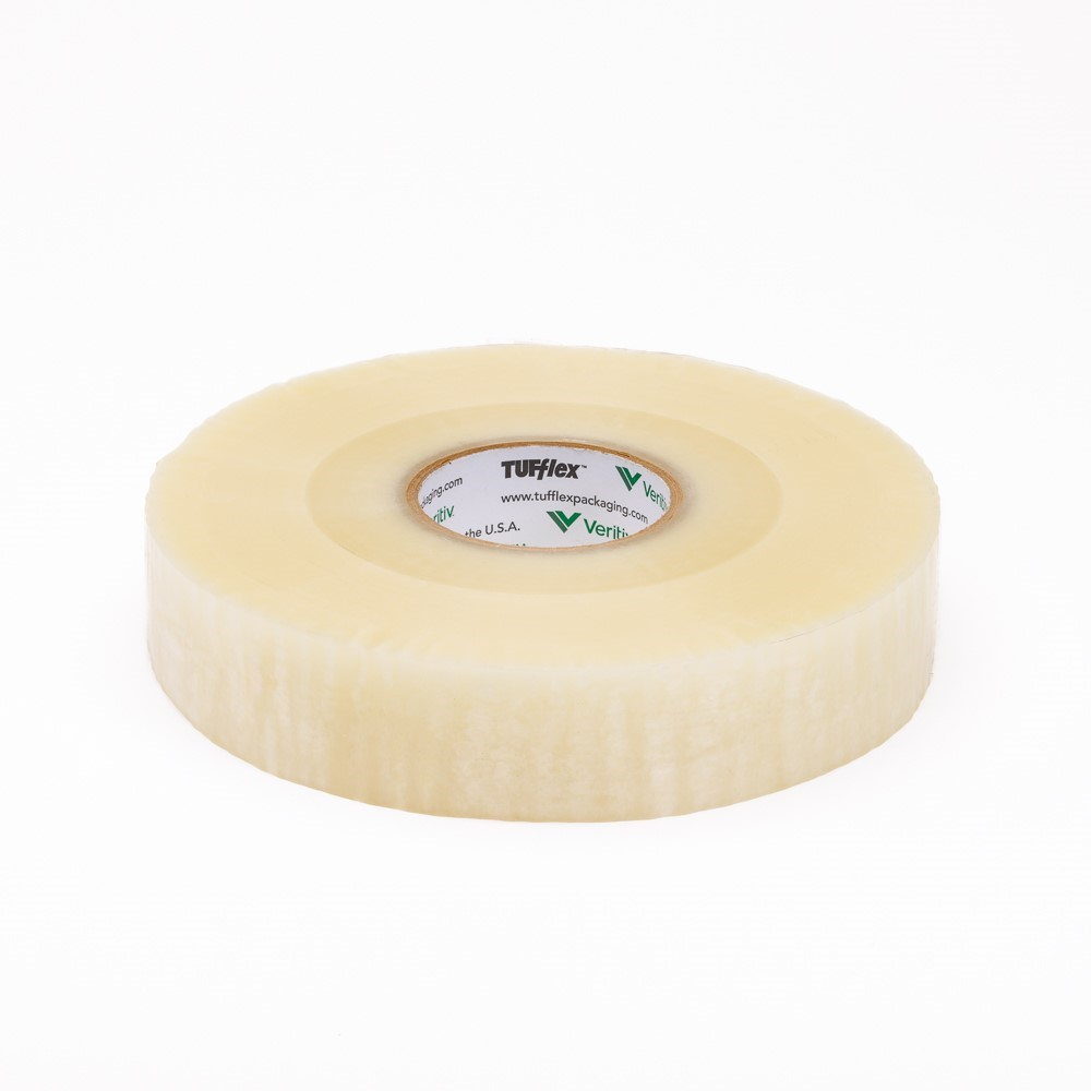 A roll of clear adhesive tape with a white core, placed on a white background TUFflex 1.9 mil. Clear Carton Sealing Tape Roll (48 mm. x 1500 m., 6 RL/CS)